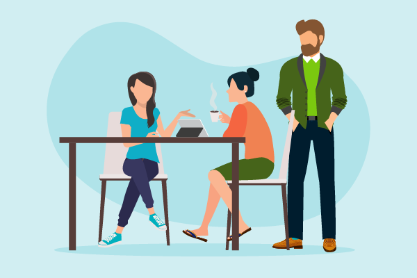 Family sitting around table, discussing how to choose a loan 